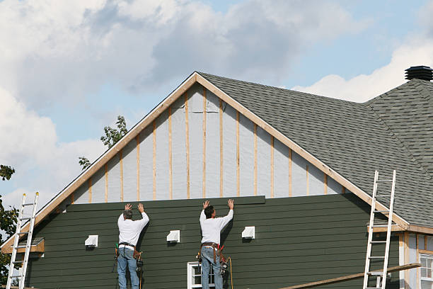 Professional Emergency Siding Repair technician working in Burgess, VA